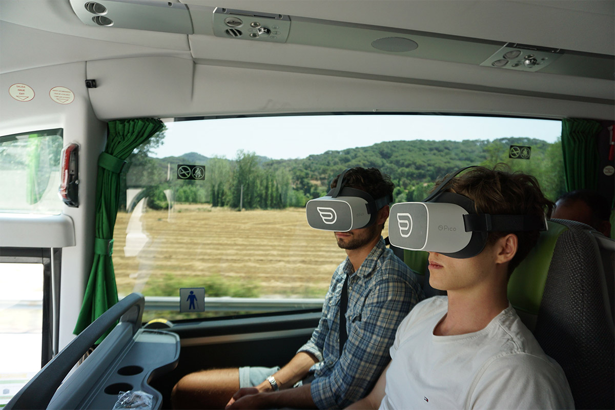 Two mens with Pico headsets having inflight vr experience on flixbus