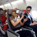 Women having a inflight vr experience inside a iberia's cabin airplane